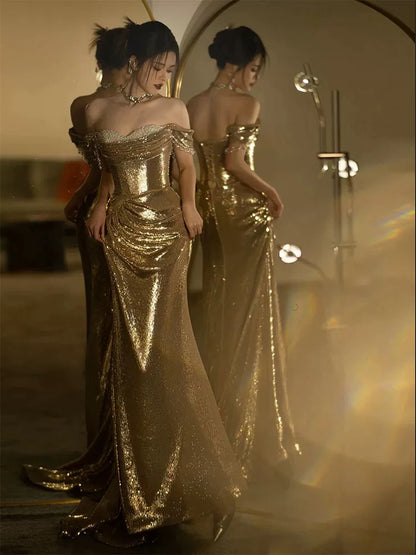 Meerjungfrauen-Abendkleid mit schulterfreiem Rock, goldenen Pailletten und kurzen Ärmeln – Inspiration für lange Abendoutfits und Geburtstagsoutfits AB2211