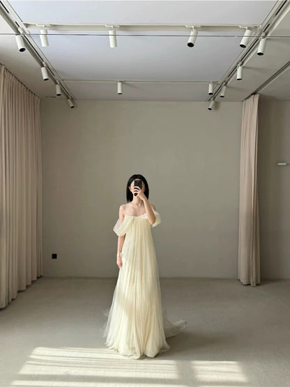 Robe de mariée intemporelle en tulle ivoire à bretelles spaghetti et coupe trapèze, tenue de mariage de conte de fées, AU484