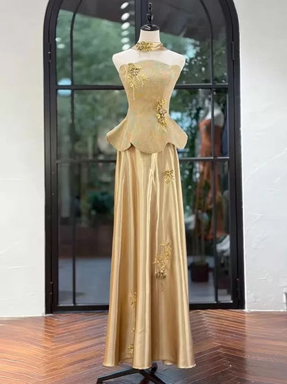 Robe de soirée longue trapèze sans bretelles en satin doré, style années 80, sans manches, pour bal de promo N2024