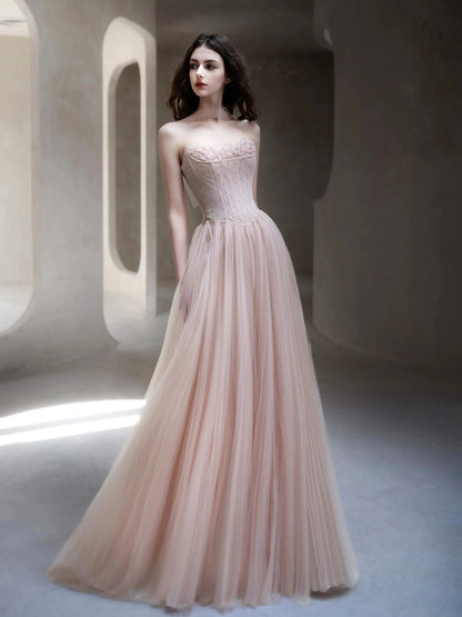 Robe de bal longue et élégante en tulle rose clair, coupe trapèze, sans bretelles, idéale pour les soirées dansantes (AB2199)