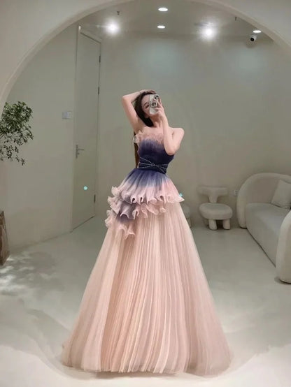 Elegantes, trägerloses Ballkleid in zartem Rosa aus Tüll – Inspiration für formelle Abendkleider und Partykleider (Modell N202)