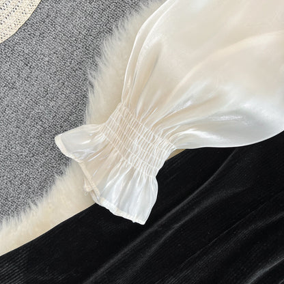 Robe noire à manches longues et col en V avec nœud et jolie robe tendance RF0211