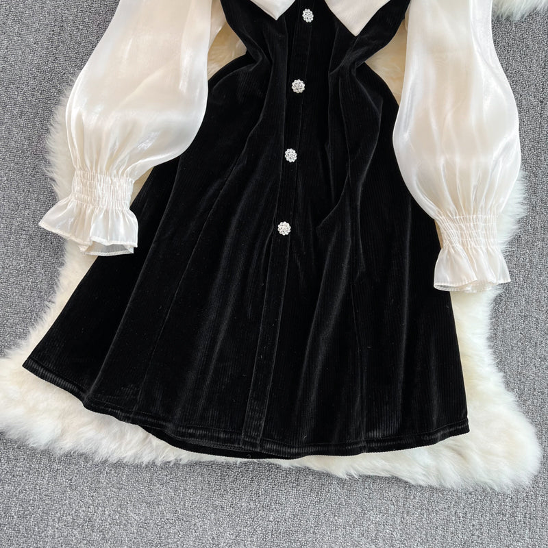 Robe noire à manches longues et col en V avec nœud et jolie robe tendance RF0211