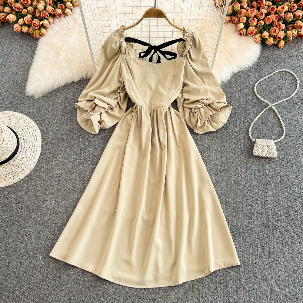 Süßes Kleid mit Schleife und Puffärmeln RF0127