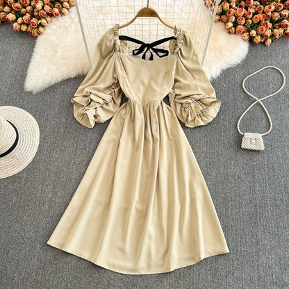 Süßes Kleid mit Schleife und Puffärmeln RF0127