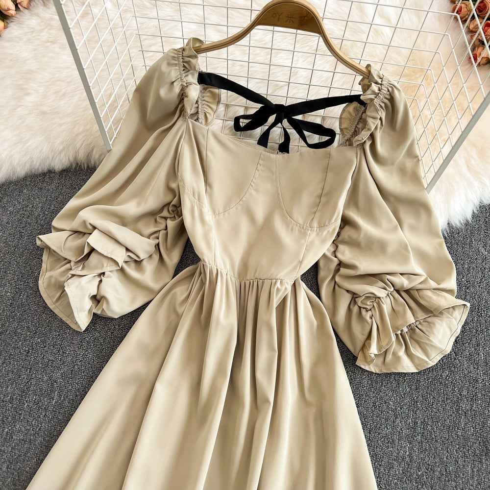 Süßes Kleid mit Schleife und Puffärmeln RF0127