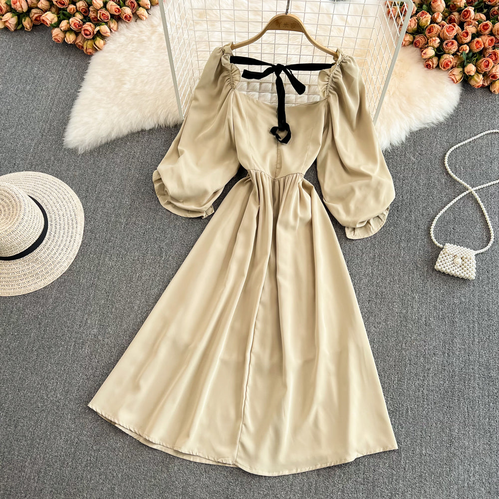 Süßes Kleid mit Schleife und Puffärmeln RF0127