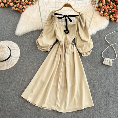 Süßes Kleid mit Schleife und Puffärmeln RF0127